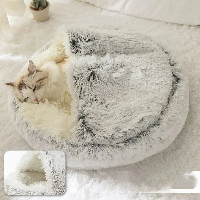 Ombonad kattsäng från PawNest, designad för att lindra ångest och ge en varm, lugn sovplats.