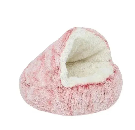 Rund, fluffig husdjursbädd, en ångestlindrande oas som ger värme och avkoppling till husdjuret.