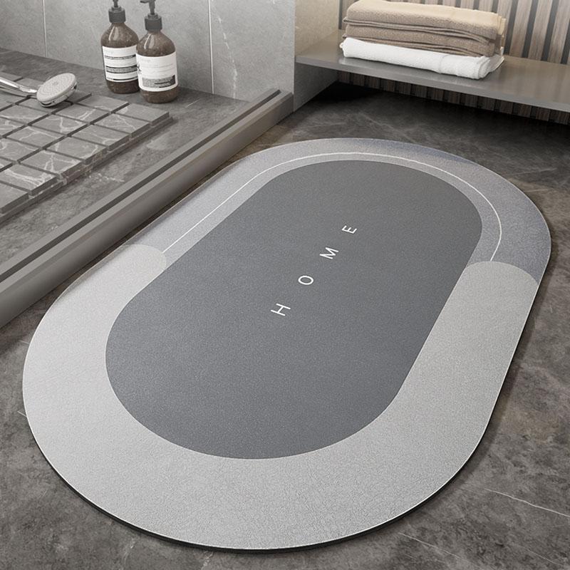 Absorberande badrumsmatta för komfort. Lyxig, mjuk och snabbtorkande oval design.