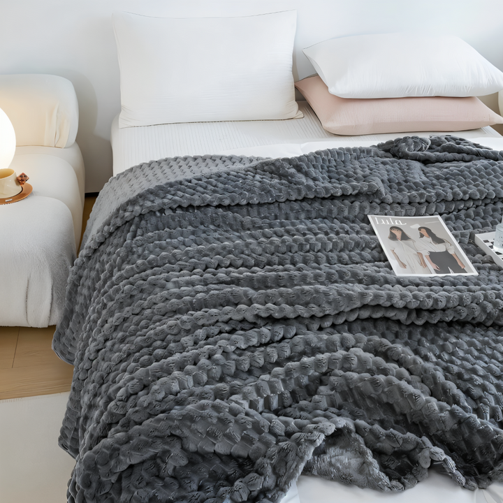 Lyxig mysfilt av polyester, mjuk och varm för kalla kvällar, idealisk som sängfilt.
