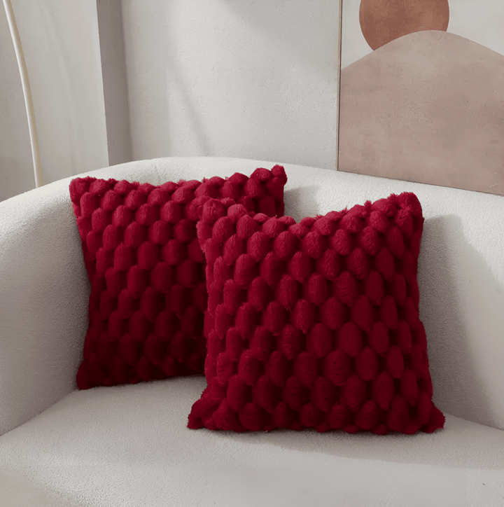 Fluffigt mönstrat dekorationskuddfodral som skapar mysig känsla i sovrummet. Mjuk textil för avkoppling.