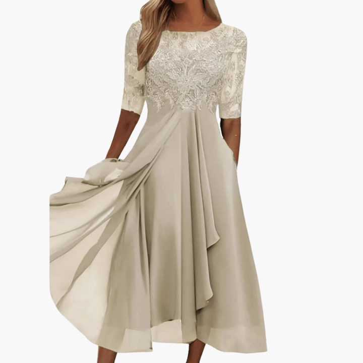 Mångsidig midi klänning dam, rund hals, korta ärmar, hög midja. Idealisk som elegant sommarklänning.