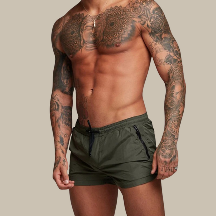 Mångsidiga stretchiga herrshorts för sommaräventyr. Snabbtorkande tyg för aktiv fritid.