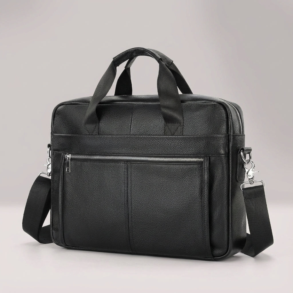 Professionell brun läderportfölj för herr, perfekt som laptopväska. Robust vintage stil.