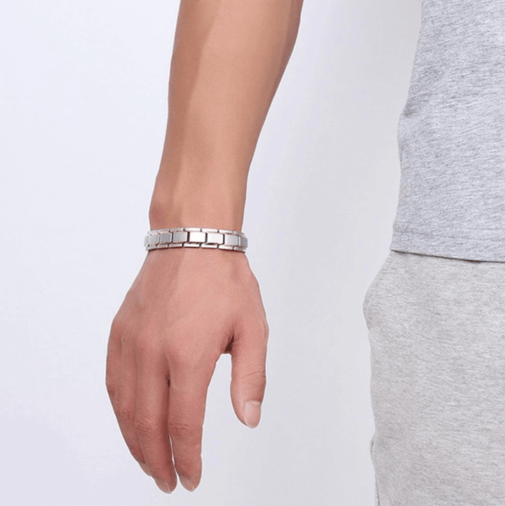 Magnetarmband CoreFlex i rostfritt stål, stilren unisex-accessoar för välmående och energi.