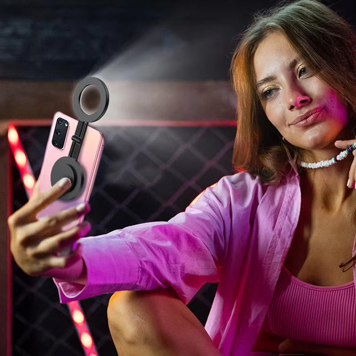 "Magnetisk selfiepinne med stativ, svart och vit, med teleskopisk design och 360° rotation för stabil och flexibel foto"