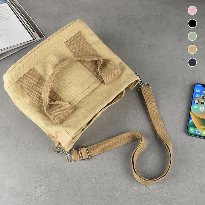 "Mångsidig kvinnors canvas handväska med flera fickor, rymlig design med dragkedja, perfekt för vardag och fest."