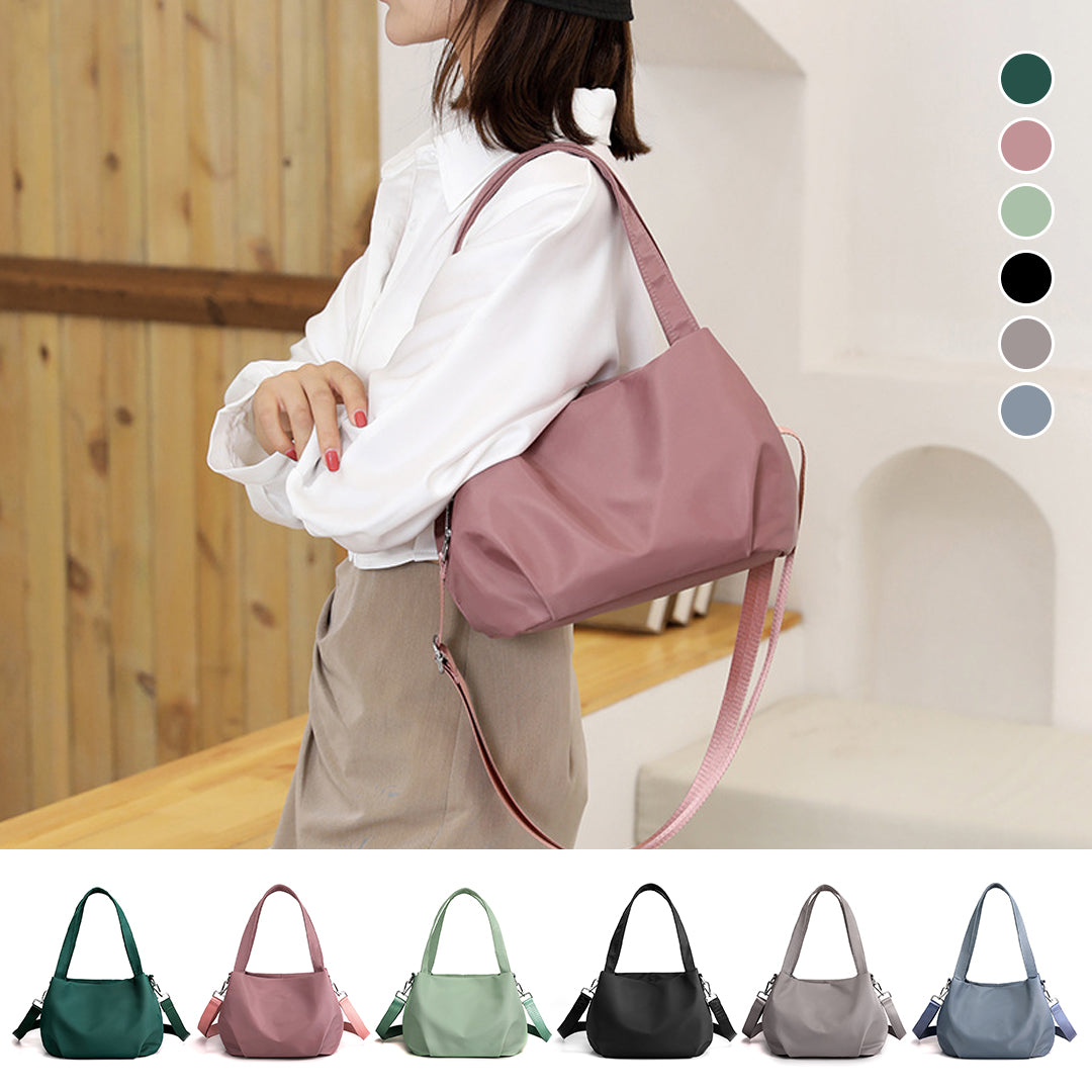 "Mångsidig nylon crossbody väska för kvinnor med ficka, justerbar rem och fler färgval, perfekt för vardag och resor."