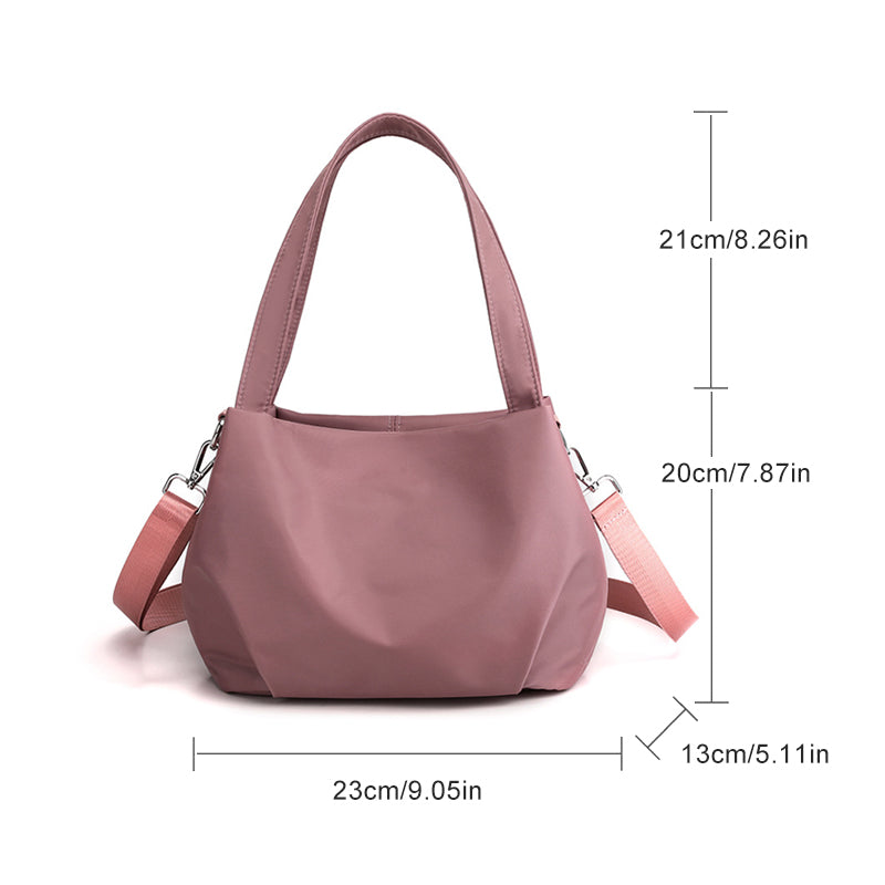 "Mångsidig nylon crossbody väska för kvinnor med ficka, justerbar rem och fler färgval, perfekt för vardag och resor."