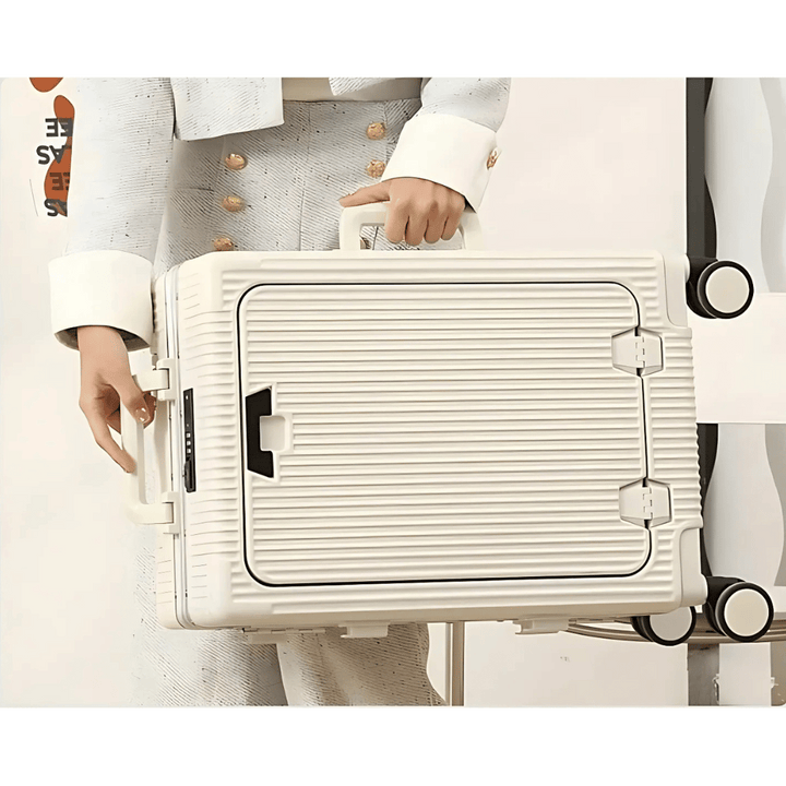 Modern Manhattan Pro handbagage med hårt skal, integrerade USB-portar och lättrullade 360-hjul.