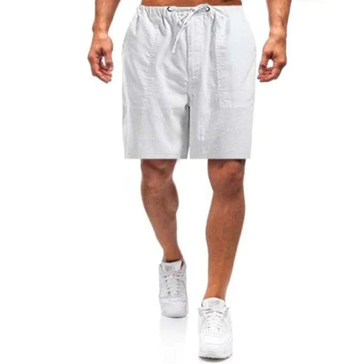 "Mäns linne shorts med lös passform, beige, elastiskt midjeband och dragsko, idealiska för sommardagar."