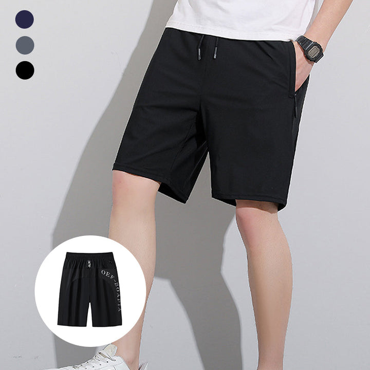 "Mäns sommar sportshorts med elastisk midja, avslappnad passform, svart färg, framifrån, lämplig för träning och vardag."