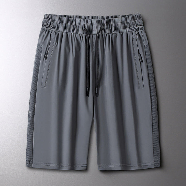 "Mäns sommar sportshorts med elastisk midja, avslappnad passform, svart färg, framifrån, lämplig för träning och vardag."