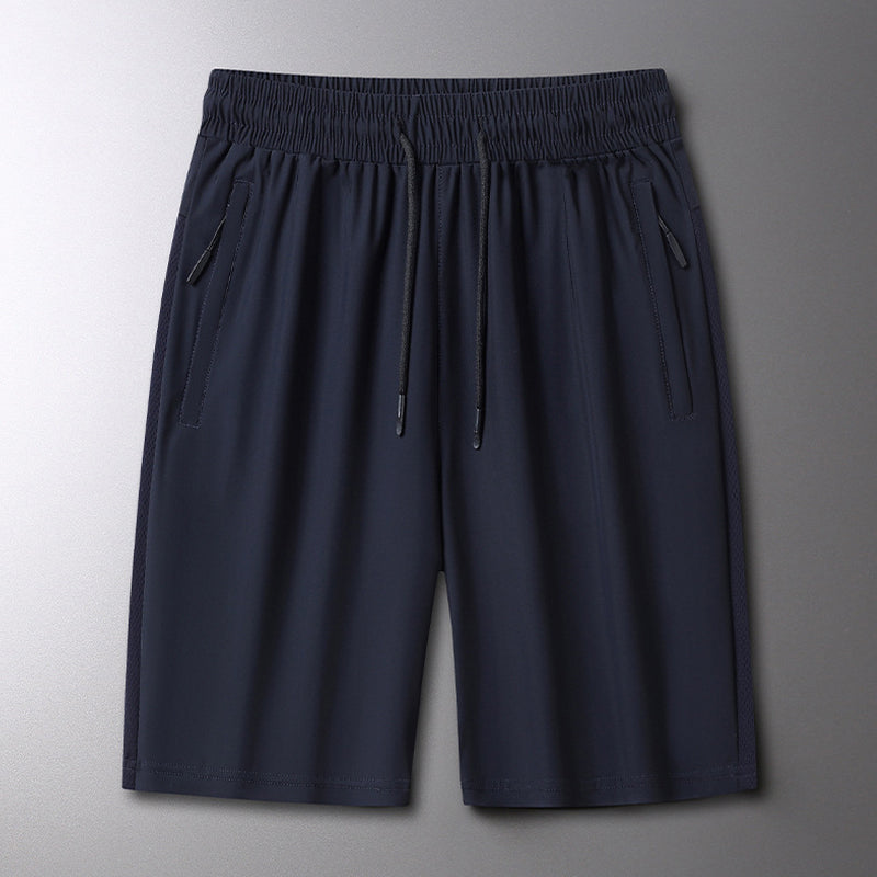 "Mäns sommar sportshorts med elastisk midja, avslappnad passform, svart färg, framifrån, lämplig för träning och vardag."