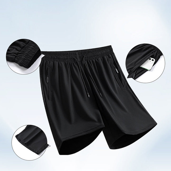 "Mäns sommar sportshorts med elastisk midja, avslappnad passform, svart färg, framifrån, lämplig för träning och vardag."