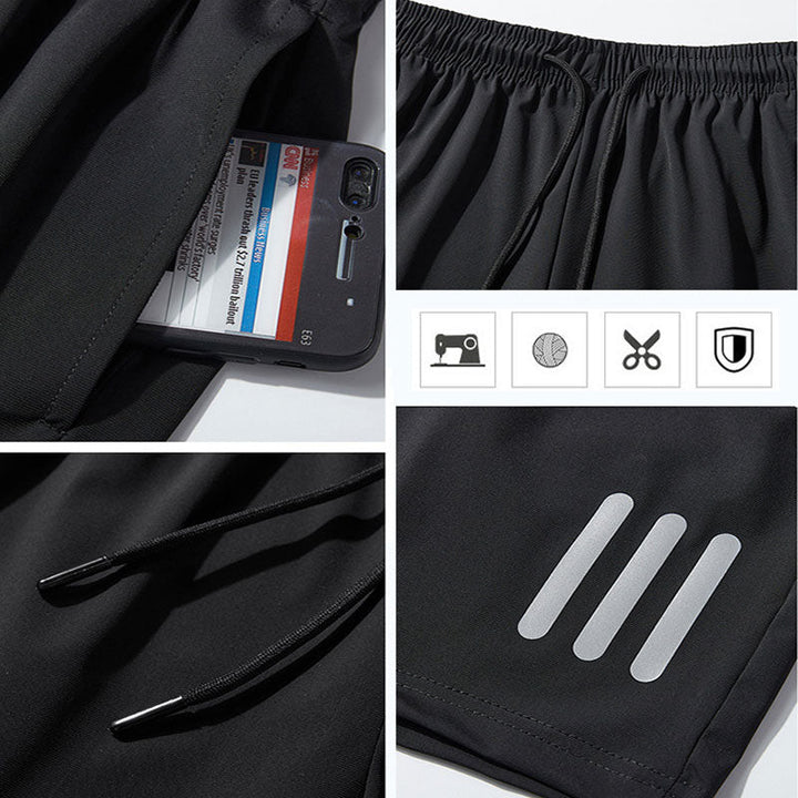 "Mäns sommar sportshorts med elastisk midja, avslappnad passform, svart färg, framifrån, lämplig för träning och vardag."
