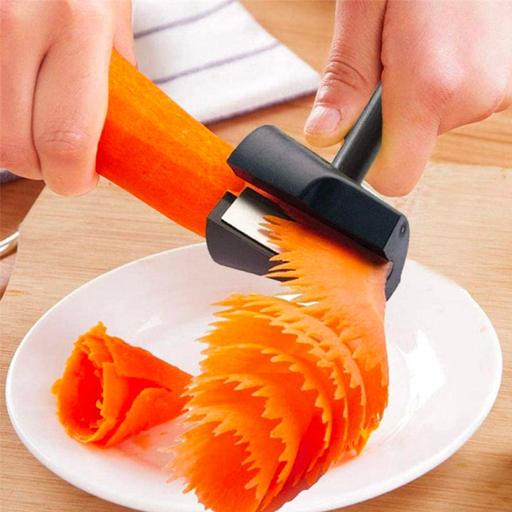 "Manuell grönsaksskärare i ABS och rostfritt stål, kompakt köksverktyg för kreativ grönsaksskärning, hållbar och stilren."