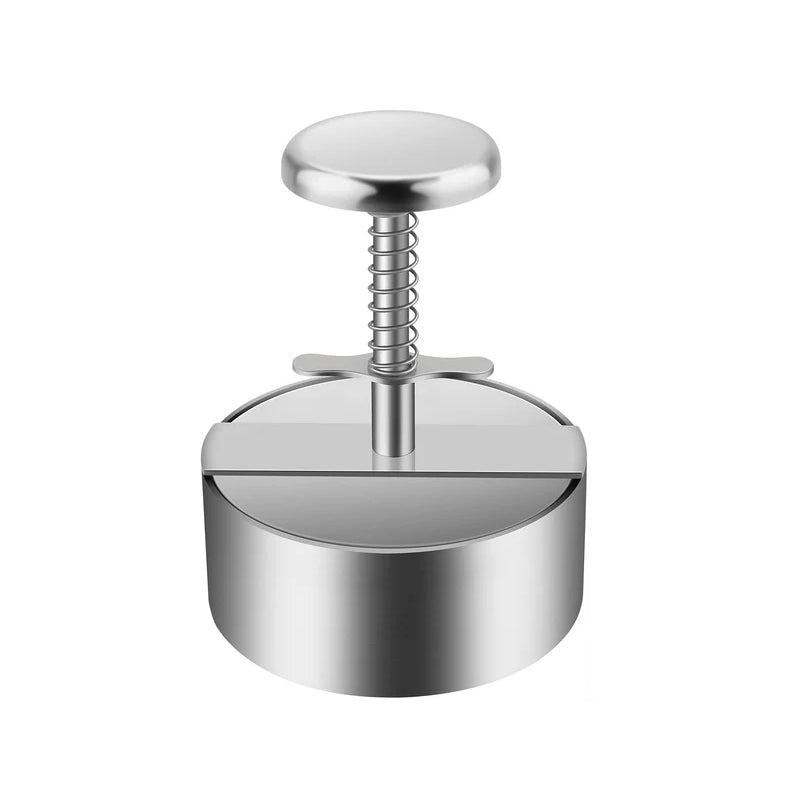 "Manuell köttpress i rostfritt stål, silverfärgad, ergonomisk design för perfekta hamburgerplättar, köksredskap."