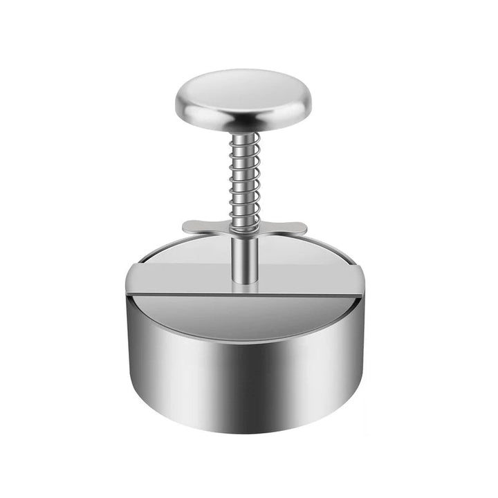 "Manuell köttpress i rostfritt stål, silverfärgad, ergonomisk design för perfekta hamburgerplättar, köksredskap."