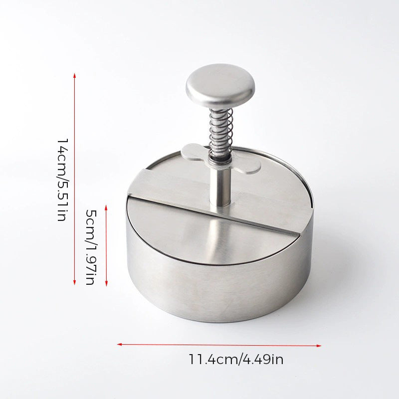 "Manuell köttpress i rostfritt stål, silverfärgad, ergonomisk design för perfekta hamburgerplättar, köksredskap."