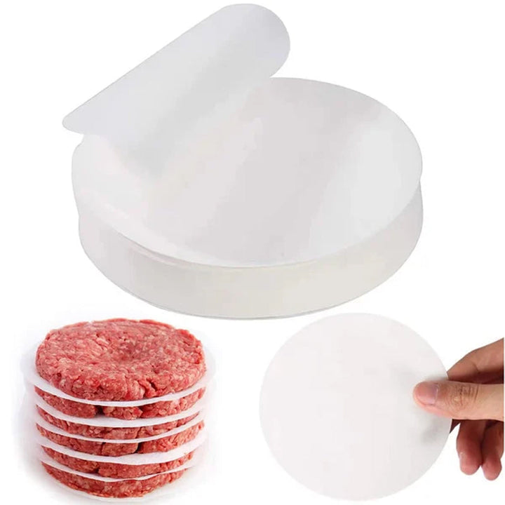 "Manuell köttpress i rostfritt stål, silverfärgad, ergonomisk design för perfekta hamburgerplättar, köksredskap."