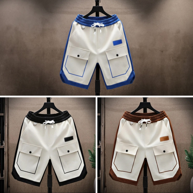 Närbild på herrshorts med fickdetaljer och justerbart dragsko, komfort för fritid.