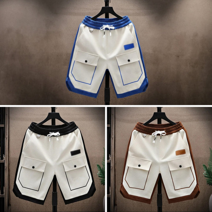 Närbild på herrshorts med fickdetaljer och justerbart dragsko, komfort för fritid.