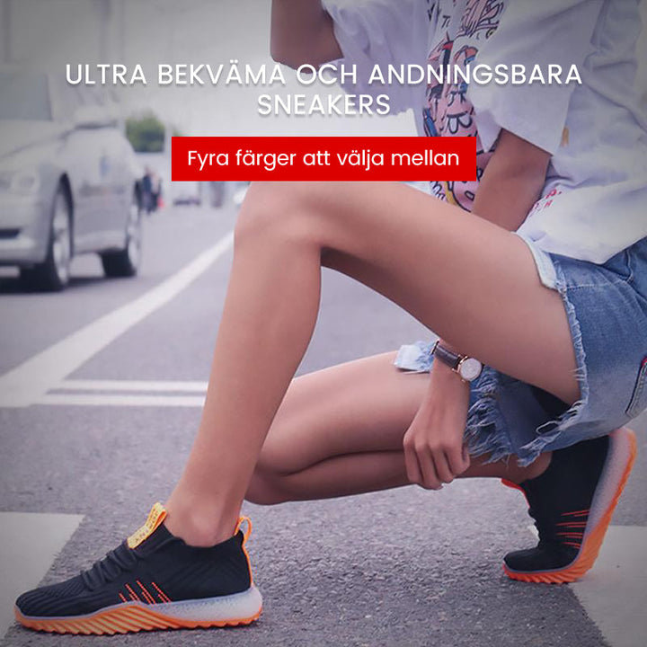 "Mesh dam sneakers i sportig design med vit andningsbar ovandel och halkfri yttersula, perfekt för aktiv livsstil."