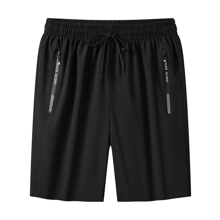 "Meshshorts för män i lätt material med elastiskt midjeband och fickor, perfekt för sommarens aktiva dagar."