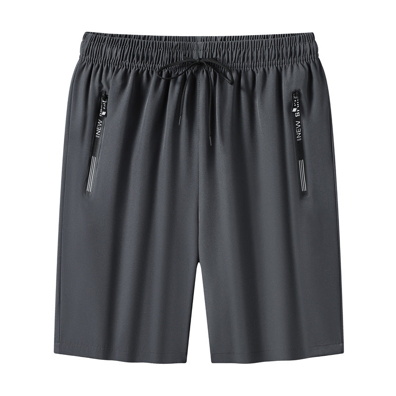 "Meshshorts för män i lätt material med elastiskt midjeband och fickor, perfekt för sommarens aktiva dagar."
