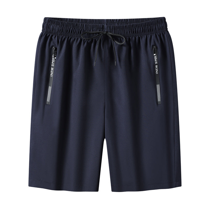 "Meshshorts för män i lätt material med elastiskt midjeband och fickor, perfekt för sommarens aktiva dagar."