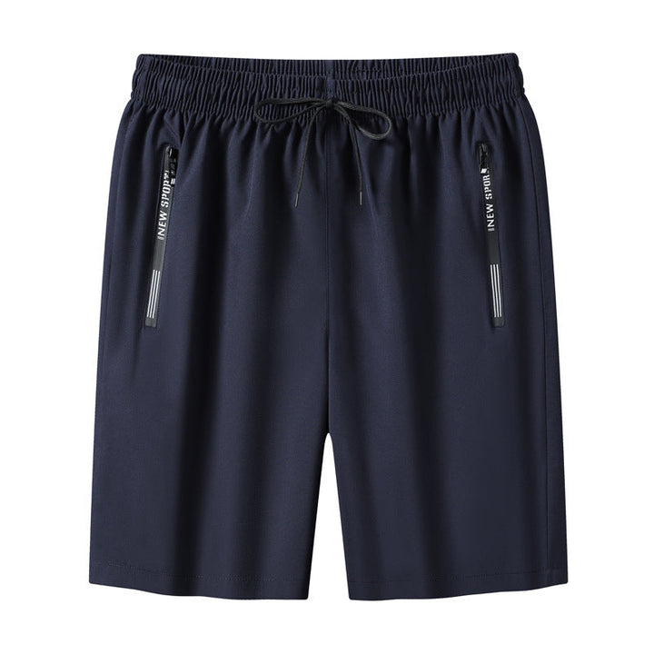 "Meshshorts för män i lätt material med elastiskt midjeband och fickor, perfekt för sommarens aktiva dagar."
