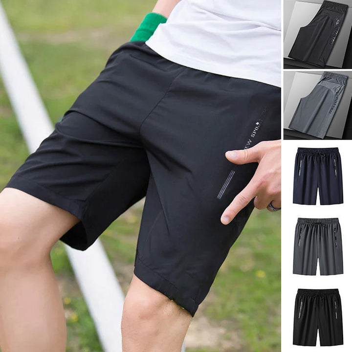 "Meshshorts för män i lätt material med elastiskt midjeband och fickor, perfekt för sommarens aktiva dagar."