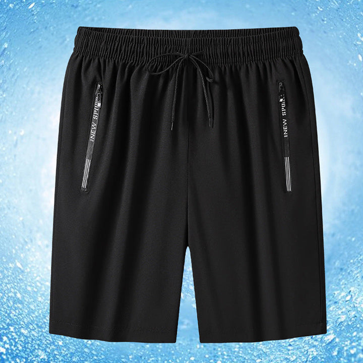 "Meshshorts för män i lätt material med elastiskt midjeband och fickor, perfekt för sommarens aktiva dagar."