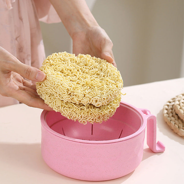 "Mikrovågssäker ramen-skål med lock i multifärg, perfekt för snabba måltider. Visas i lila, svart, beige och rosa."