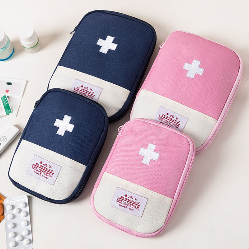 "Mini bärbar medicinsk väska i rött slitstarkt Oxford-tyg med vit korssymbol för enkel identifiering i nödsituationer"