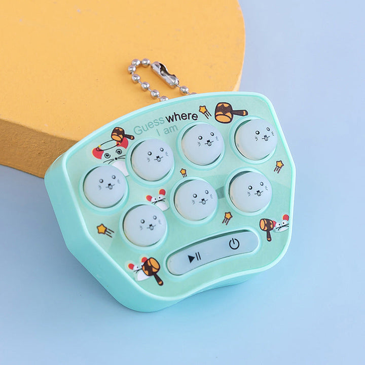 "Mini Jordekorre-spel för barn, elektronisk leksak i blått, rosa, lila eller grönt. Perfekt för hand-öga-koordination."