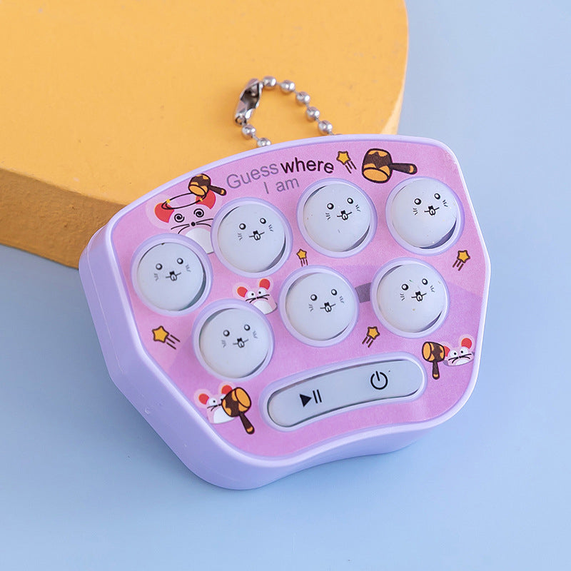 "Mini Jordekorre-spel för barn, elektronisk leksak i blått, rosa, lila eller grönt. Perfekt för hand-öga-koordination."
