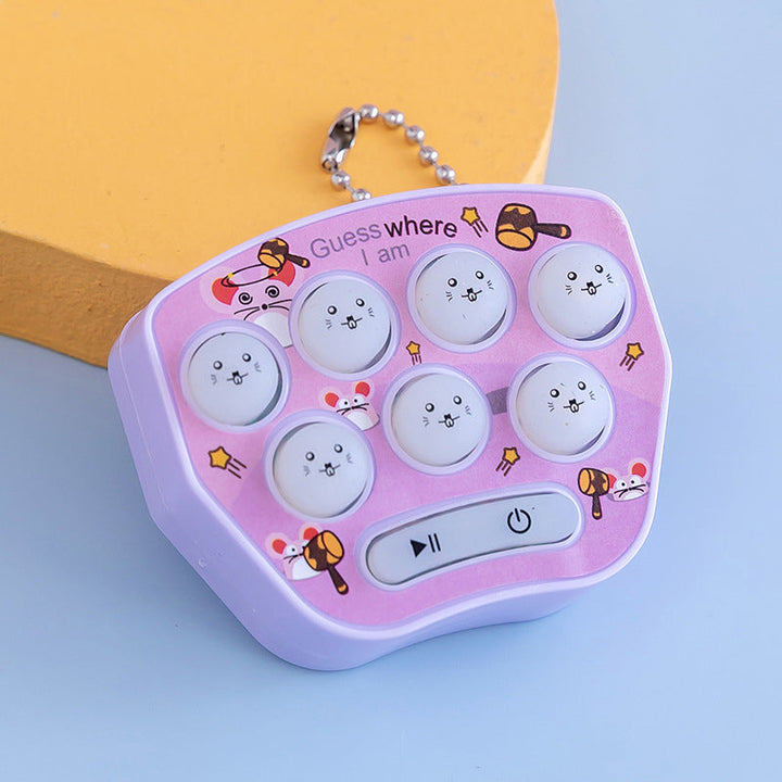 "Mini Jordekorre-spel för barn, elektronisk leksak i blått, rosa, lila eller grönt. Perfekt för hand-öga-koordination."