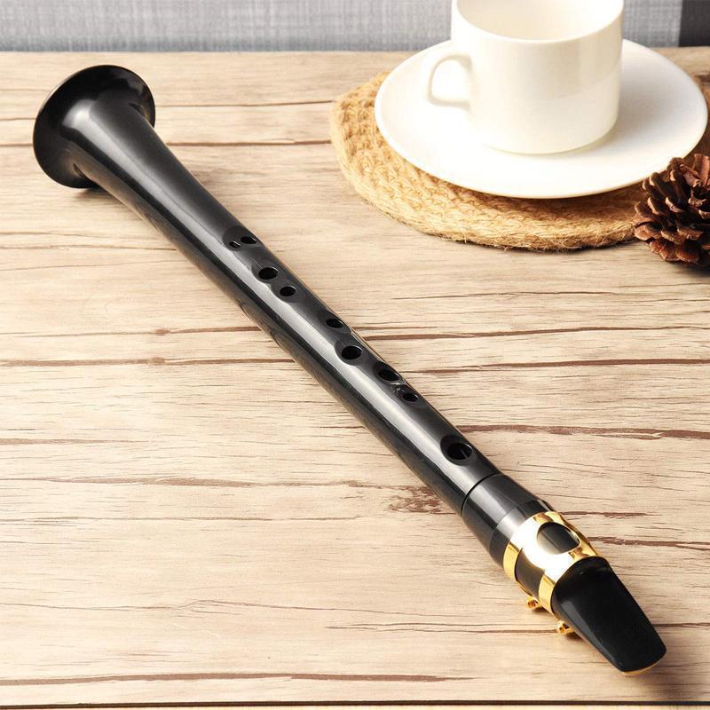 "Mini pocket saxofon för nybörjare, bärbar och lätt med solid ABS-konstruktion, ton nära riktig saxofon, svart färg."