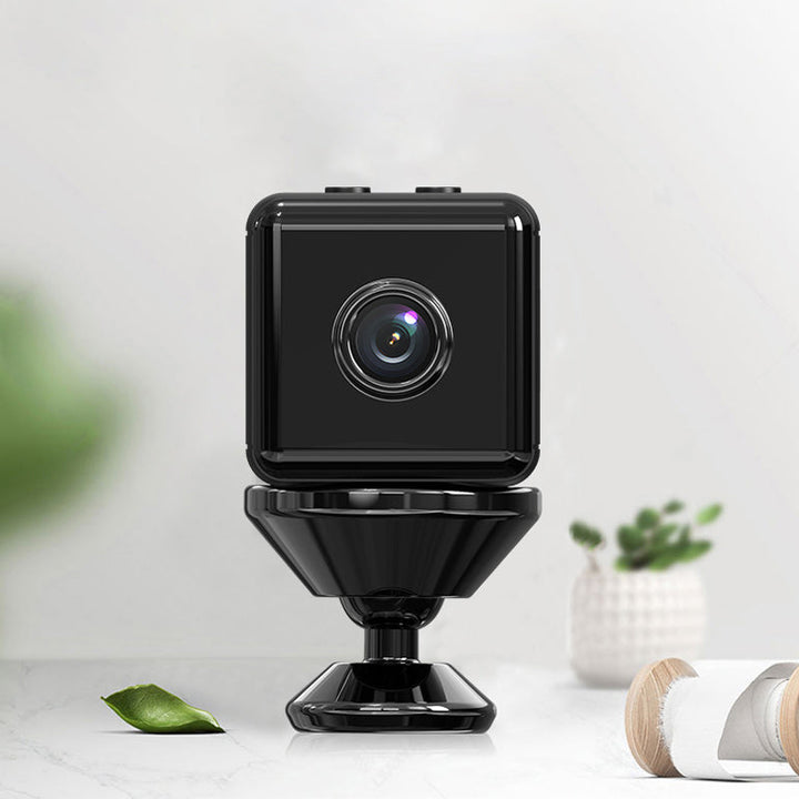 "Mini WiFi spionkamera med HD, nattseende, kompakt svart design, smälter in diskret, för hem- och husdjursövervakning."