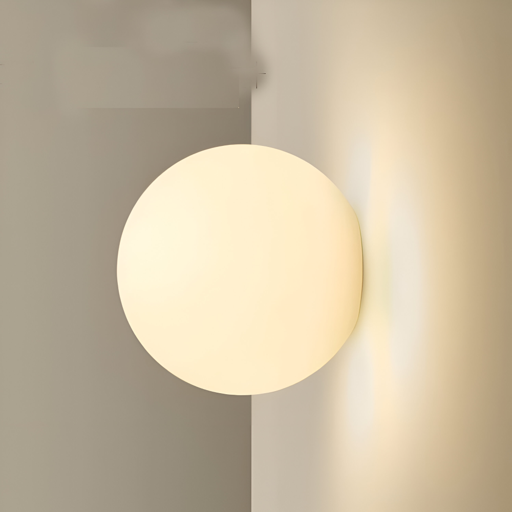 Minimalistisk rund glas vägglampa med LED för modern inomhusbelysning.
