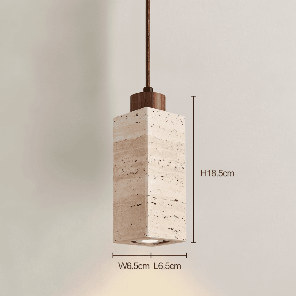 Trio minimalistiska pendellampor, skapar dynamisk belysning. Modern taklampa för stilren heminredning, varmt ljus.