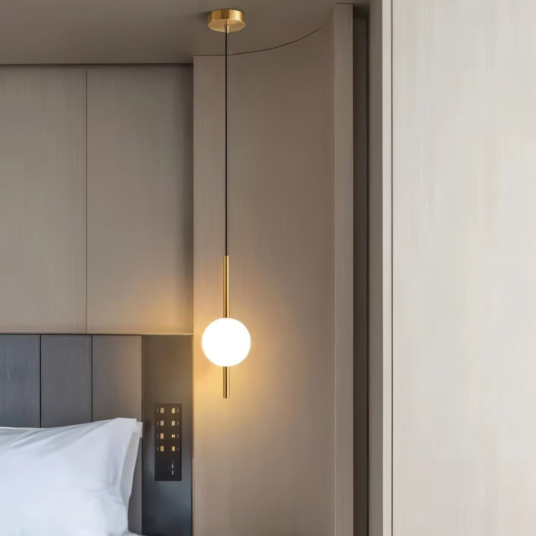 Minimalistisk vertikal LED-pendellampa i modern design, perfekt för stilren heminredning.