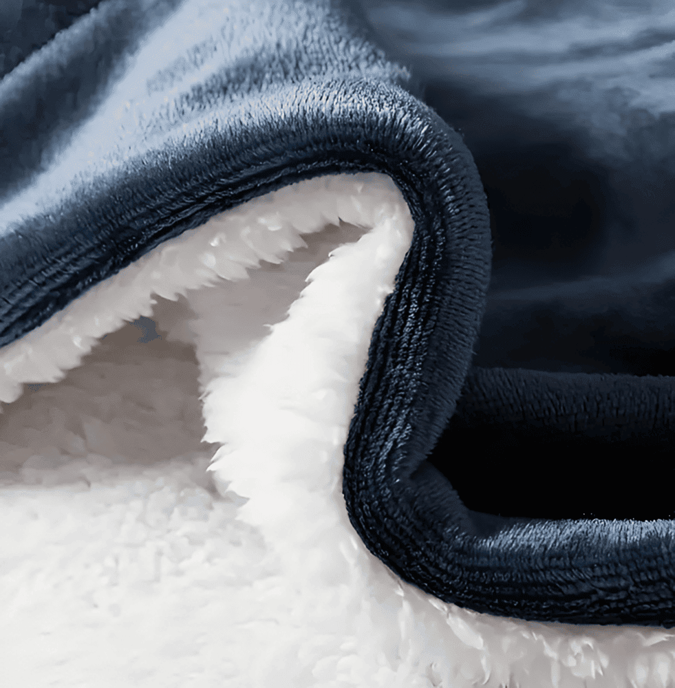 Extra värmande vinterfilt i mjuk fleece och sherpafleece. Perfekt för kalla dagar.
