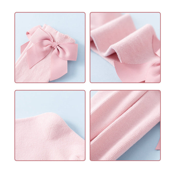 "Mjuka knähöga småbarnsstrumpor med söt rosett, idealiska för flickor. Perfekta för kyliga dagar och stilfulla outfits."