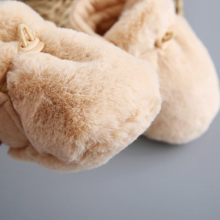 "Mjuka unisex bebis mjuksulor i beige, brun och rosa med elastisk design och halkfri sula, perfekt för små äventyrare."