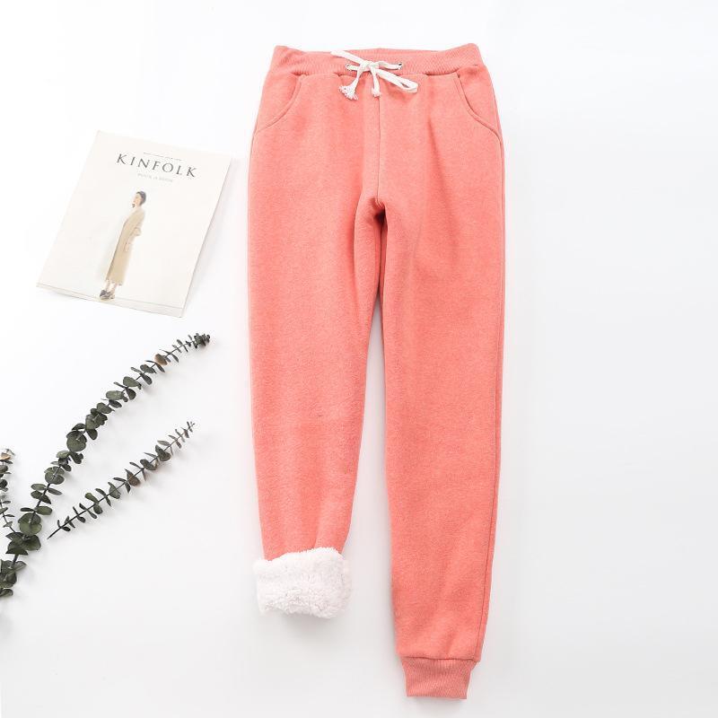 "Mjuka, värmande kashmirträningbyxor för dam i stilren fleece, perfekt för kalla dagar, i elegant, lätt design."
