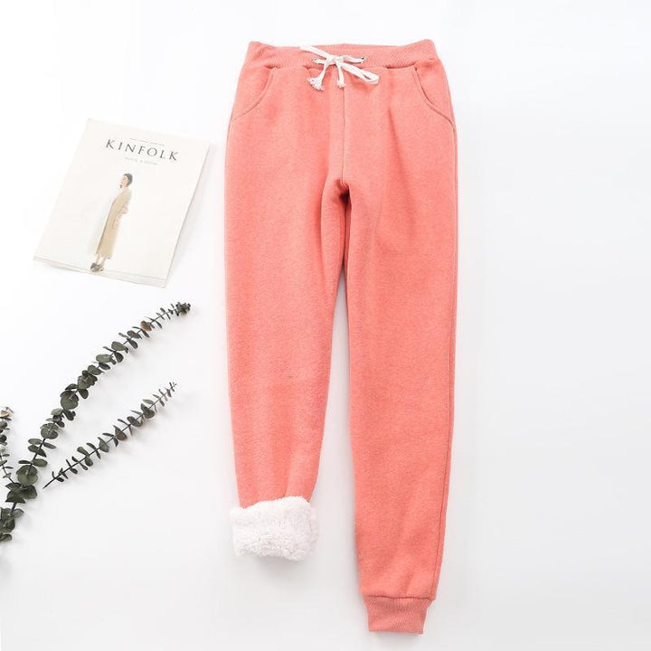 "Mjuka, värmande kashmirträningbyxor för dam i stilren fleece, perfekt för kalla dagar, i elegant, lätt design."