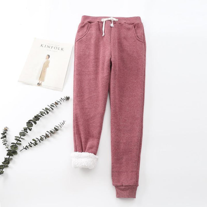 "Mjuka, värmande kashmirträningbyxor för dam i stilren fleece, perfekt för kalla dagar, i elegant, lätt design."